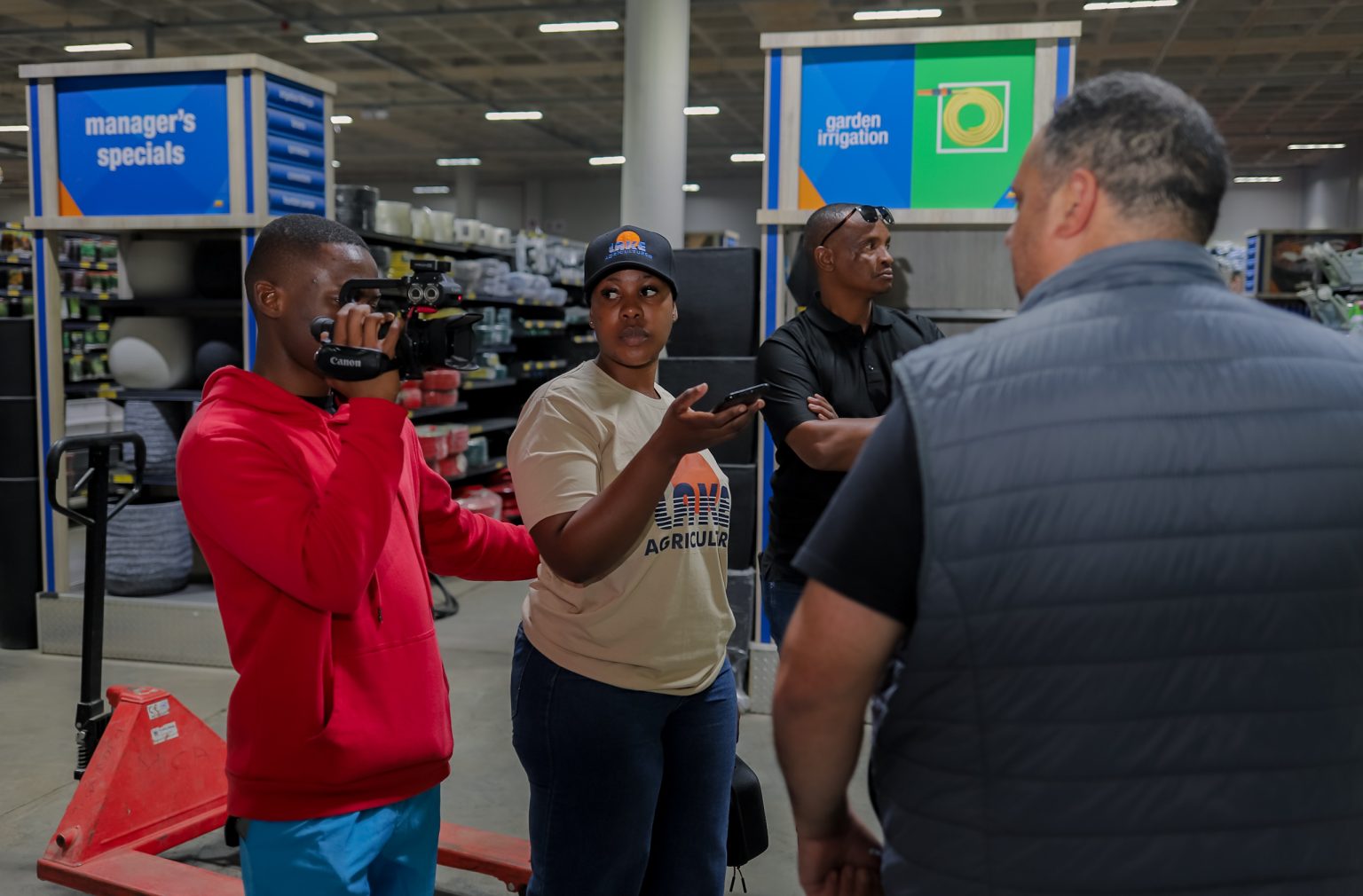 Stratcom team filming a brand story in a retail store