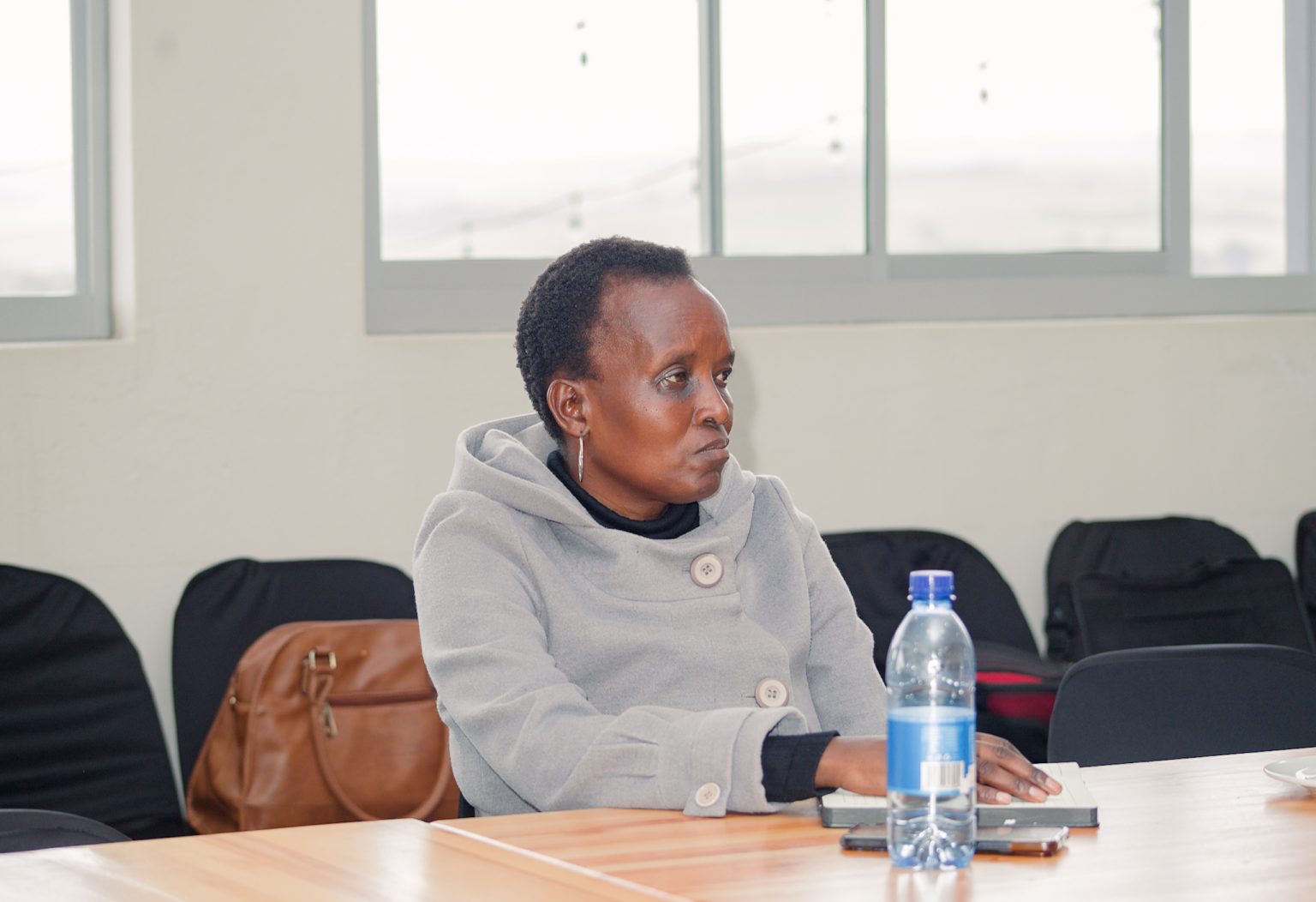 A participant listening during a Stratcom session